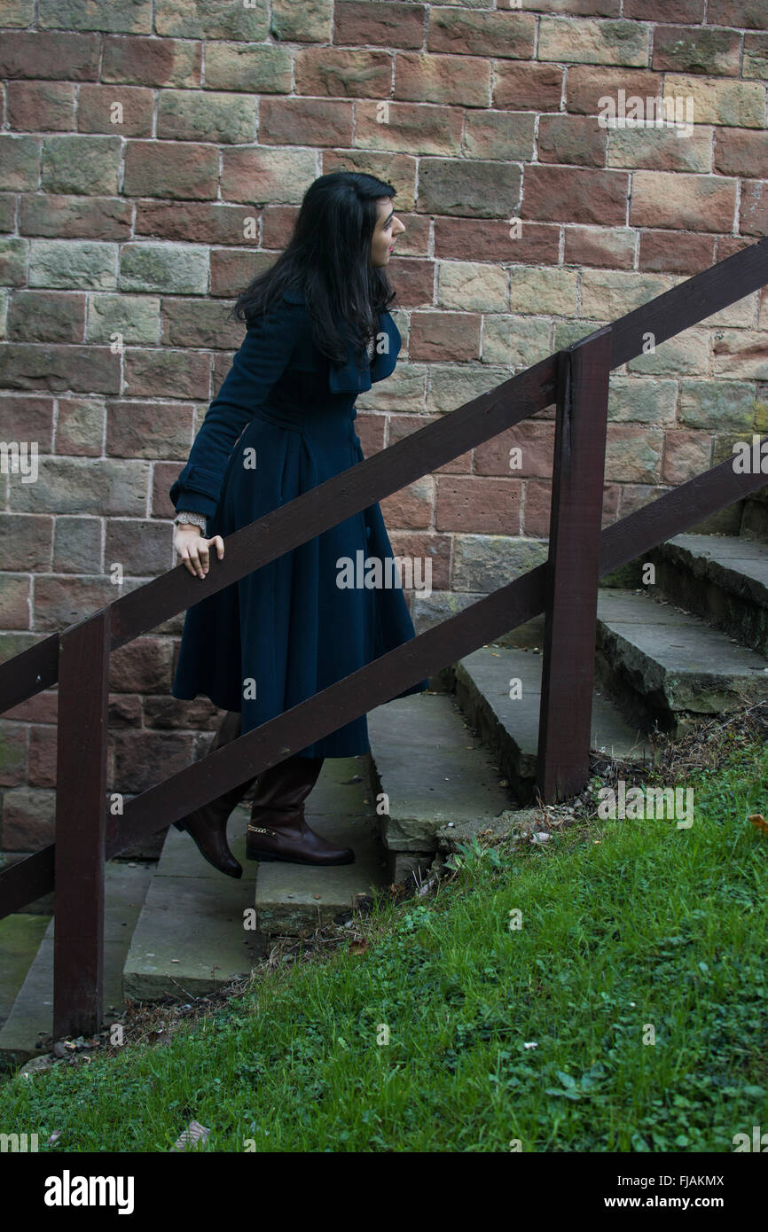 Girl walking up stairs outside hi-res stock photography and images - Alamy
