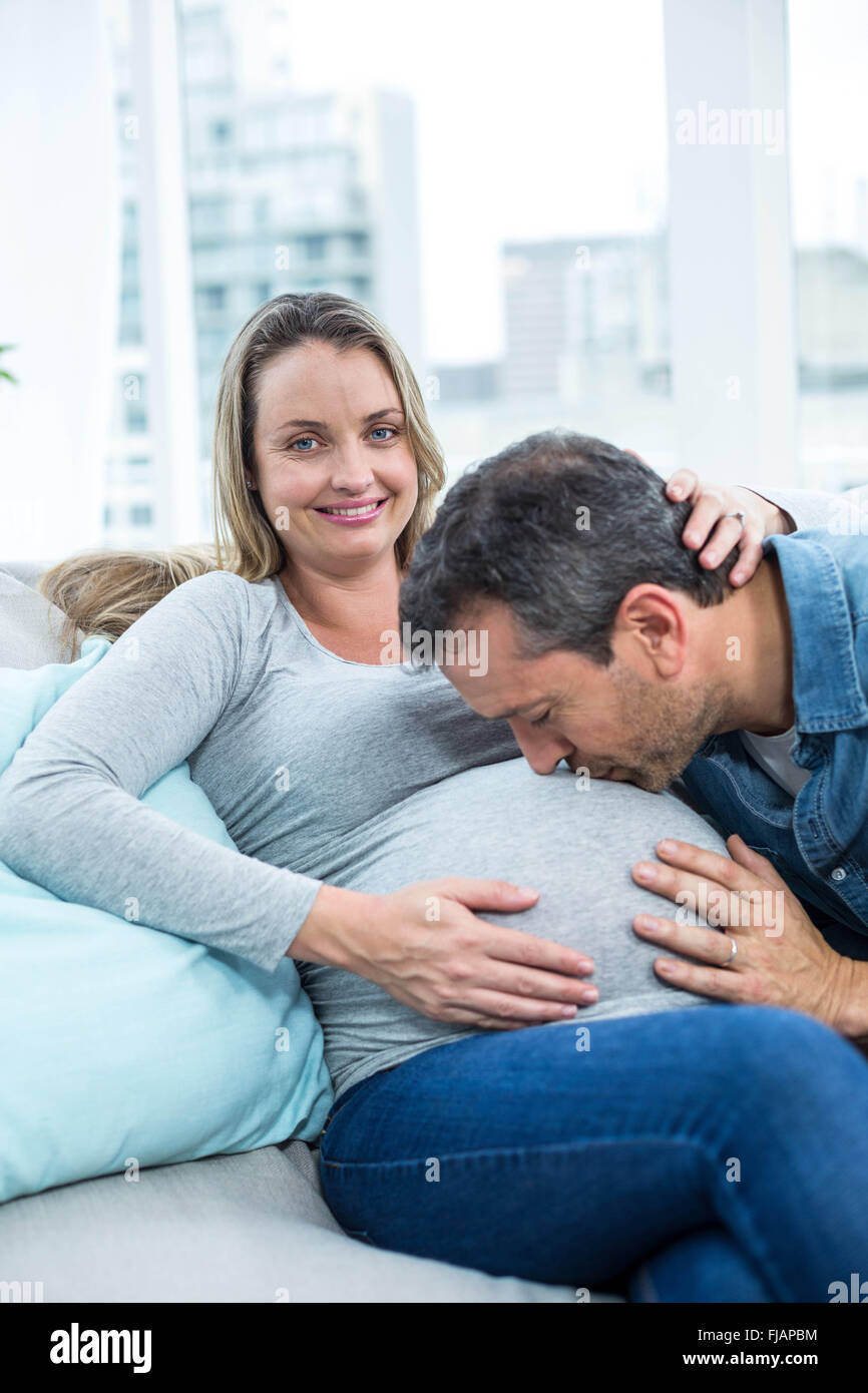 Pregnant woman man kiss stomach hires stock photography and images Alamy
