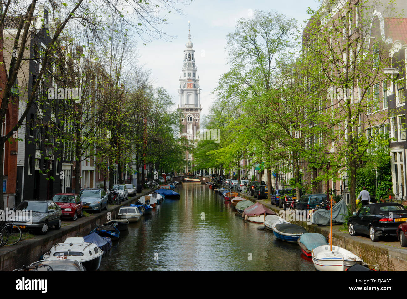 Zuiderkerk (South Church) tower and Groenburgwal canal on a Spring day, central Amsterdam, Netherlands Stock Photo