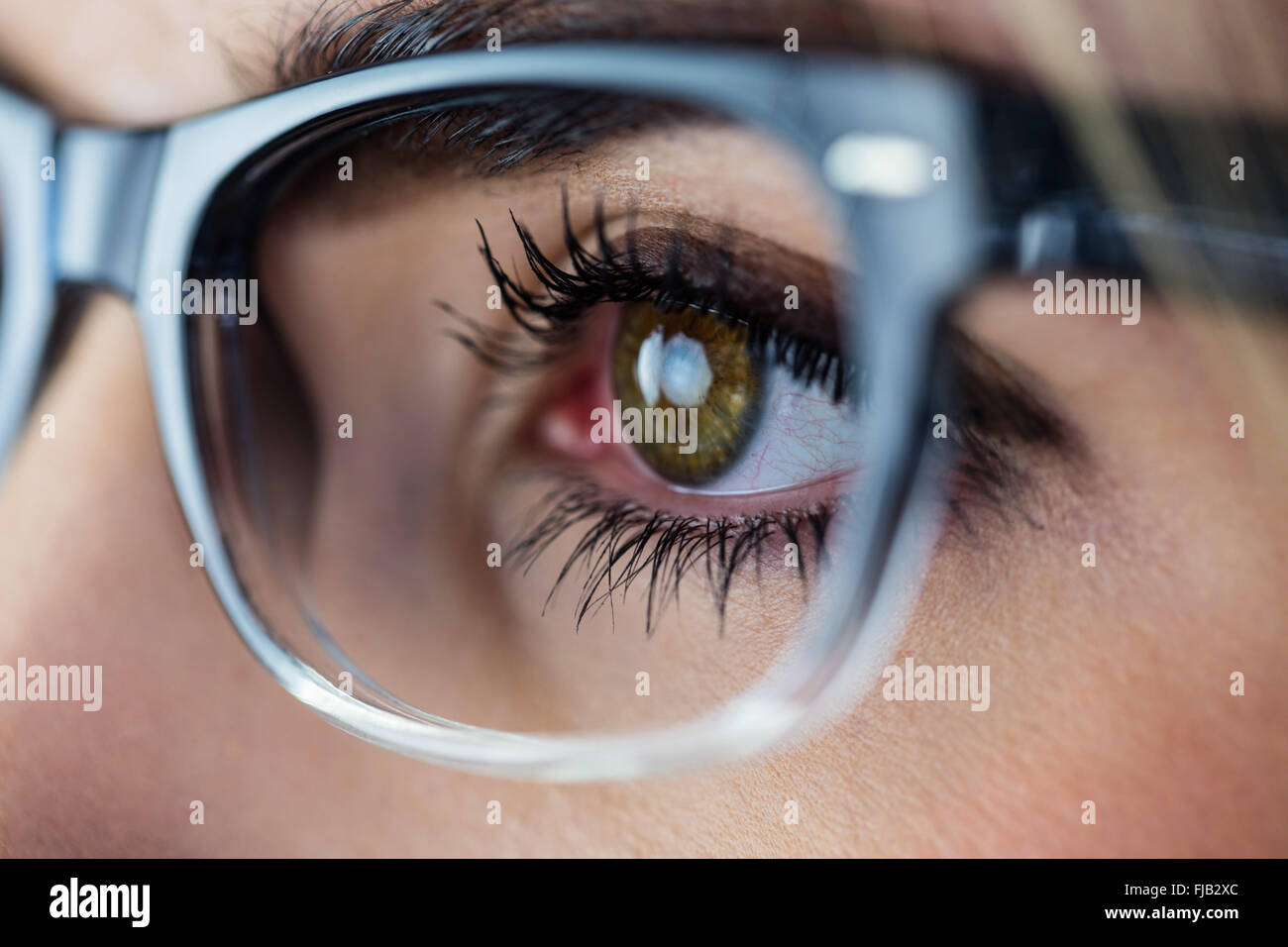 Close-up of a woman with green eyes Stock Photo