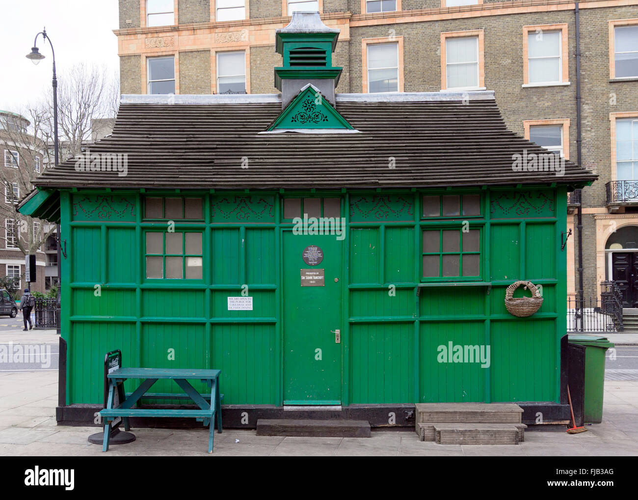 A green Cabmen's Taxi Shelter in central London, UK Stock Photo