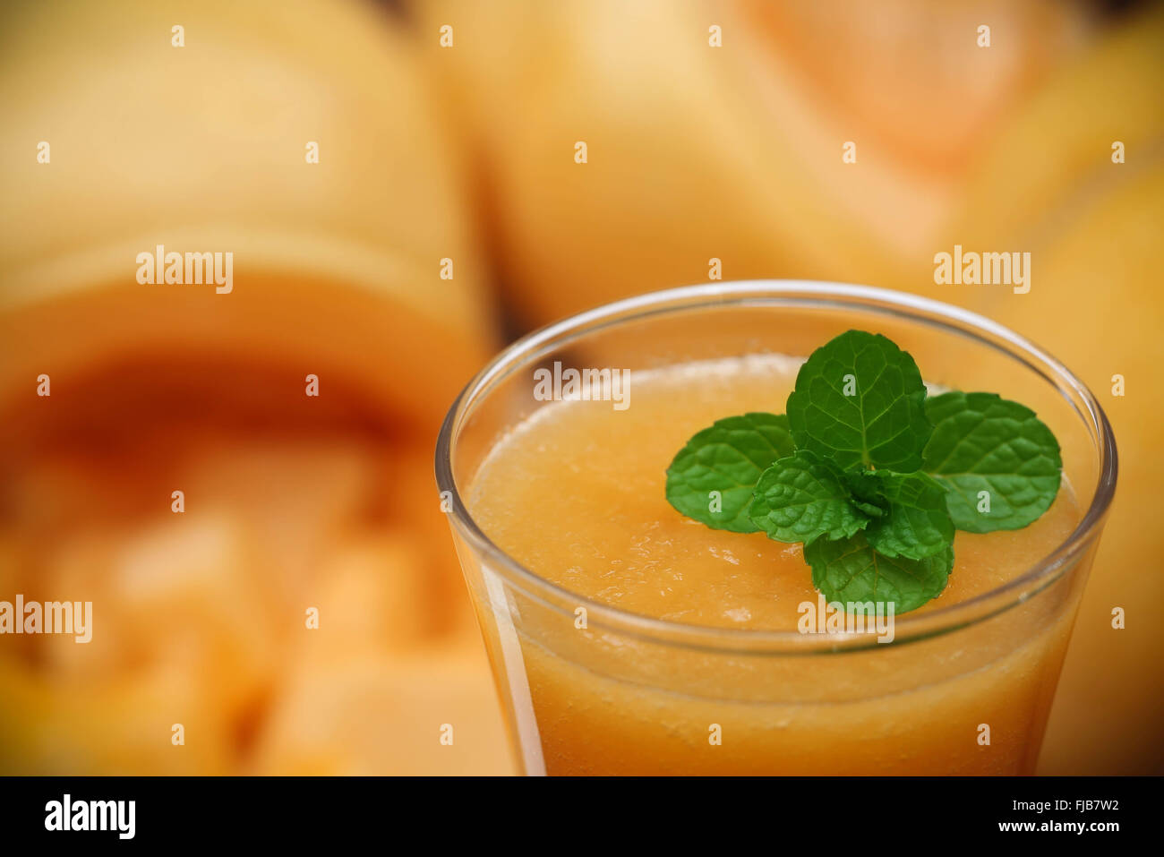 Juice of cucumis melo or muskmelon with mint leaves Stock Photo