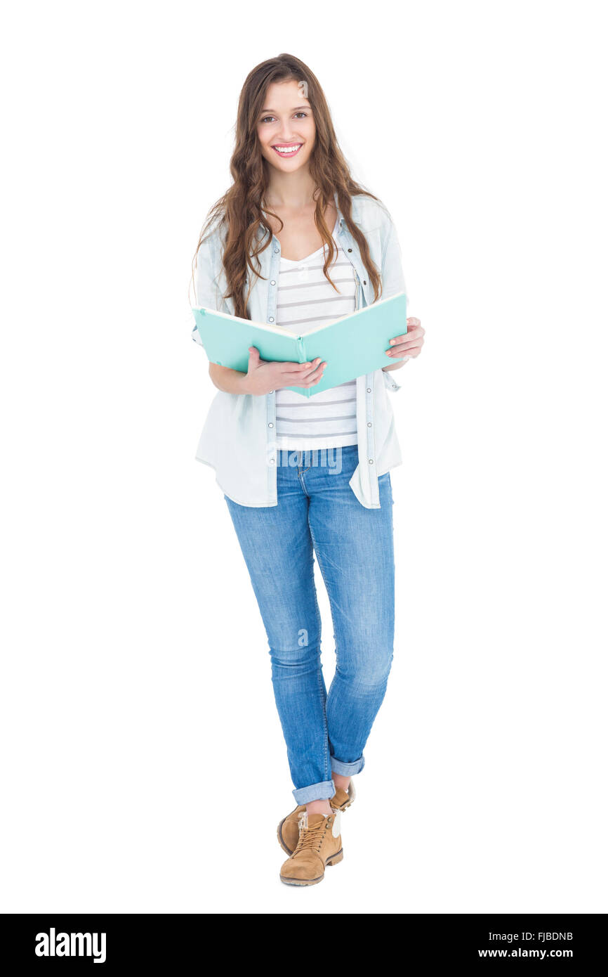 Portrait of female student reading a book Stock Photo