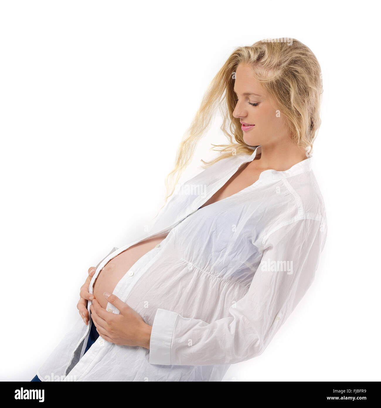 Beautiful Pregnant Woman Wearing Casual Clothes Stock Photo