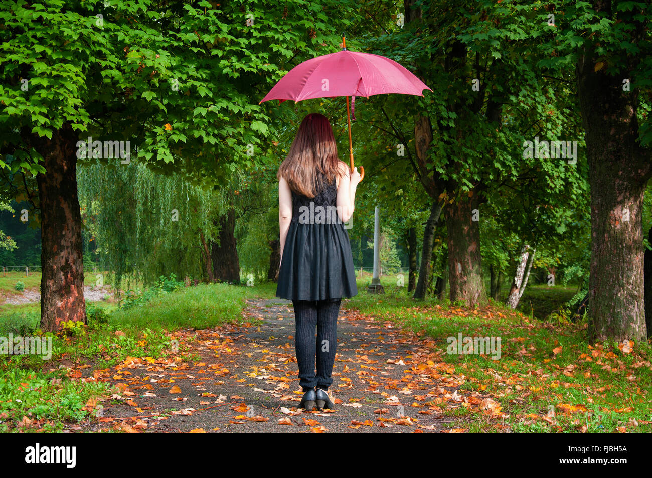 girl with umbrella Stock Photo - Alamy