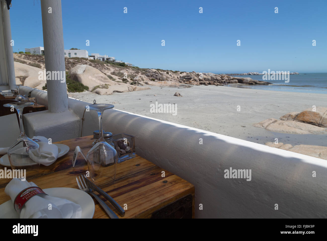 Romantic dining settling next to the beach Stock Photo