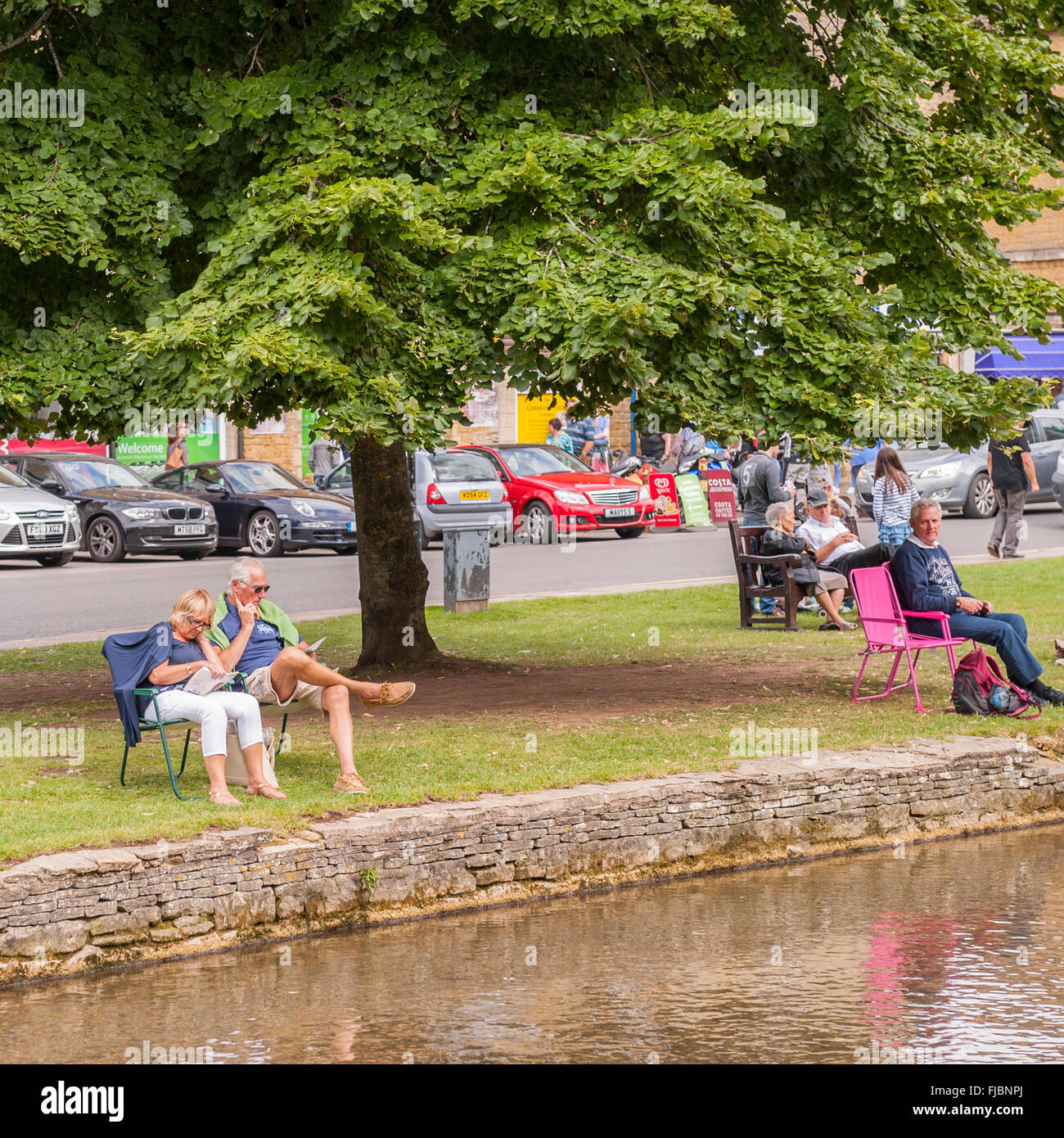 People at Bourton-On-The-Water in Gloucestershire , England , Britain , Uk Stock Photo