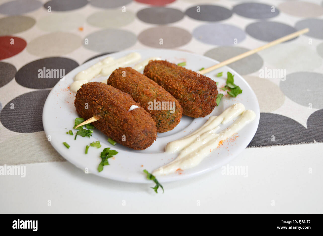 A plate of spinach croquettes, popular tapas on Tenerife. Stock Photo
