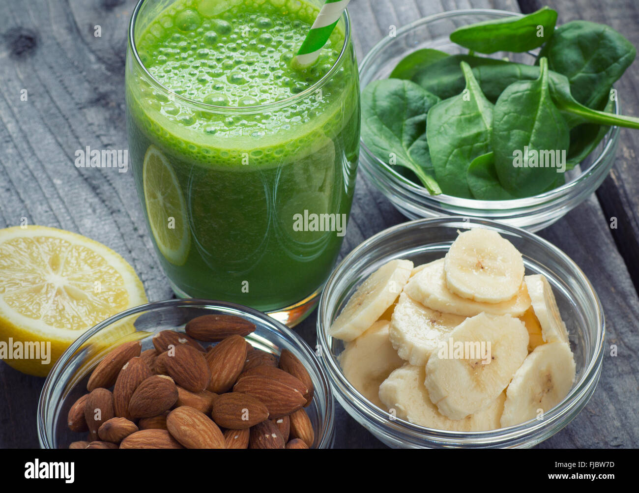Green fresh healthy smoothie with fruits and vegetables Stock Photo