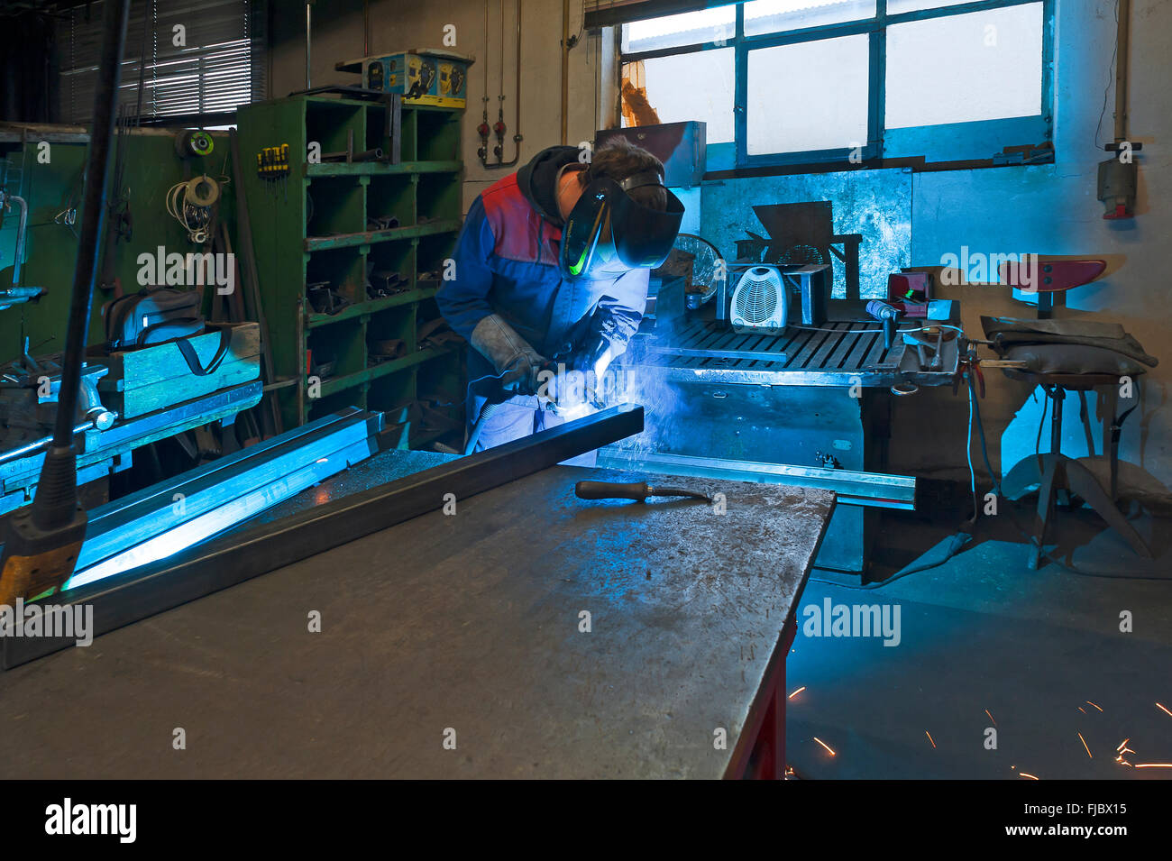 Welder at work, agricultural machinery, Middle Franconia, Bavaria