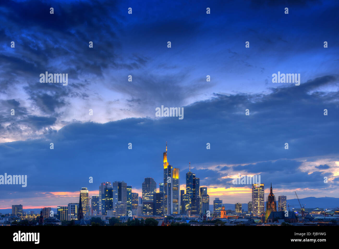Skyline, Financial District at dusk, blue hour, TaunusTurm, Tower 185, Commerzbank, Messeturm, Helaba Hessische Landesbank Stock Photo