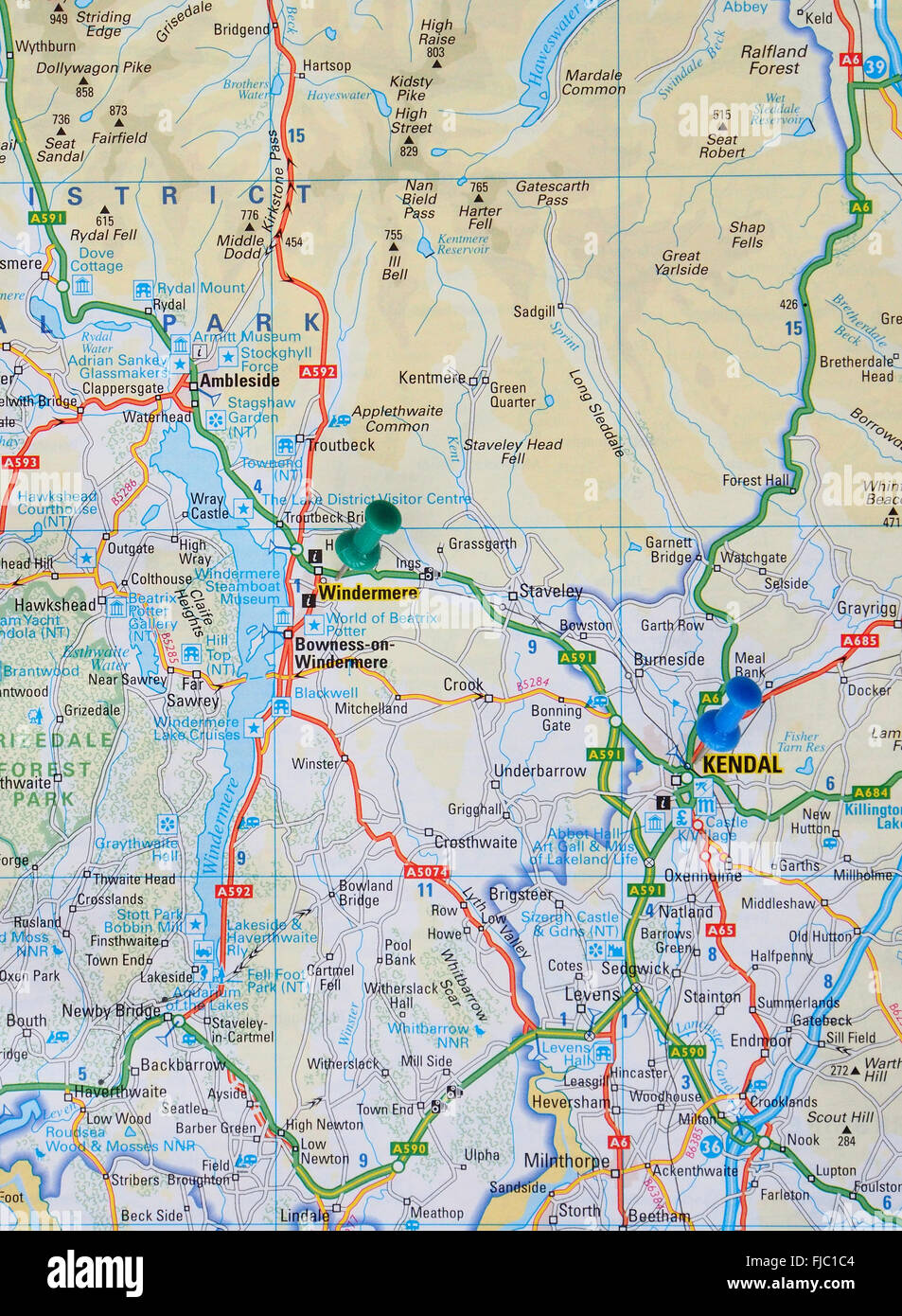 Road map of the Lake District showing Lake Windermere with map pins in the towns of Windermere and Kendal. Stock Photo