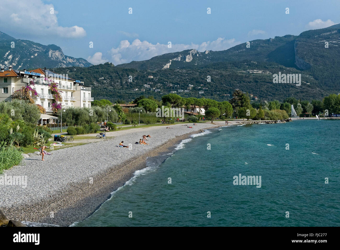 Strand, Torbole, Gardasee, Trentino, Italien | Beach, Torbole, Lake Garda, Trentino, Italy Stock Photo