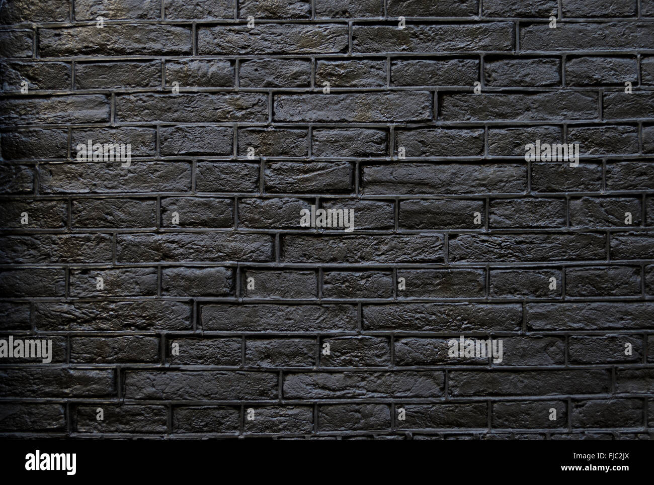 Dark Grey Brick Wall Suitable For Use As A Background Stock Photo Alamy