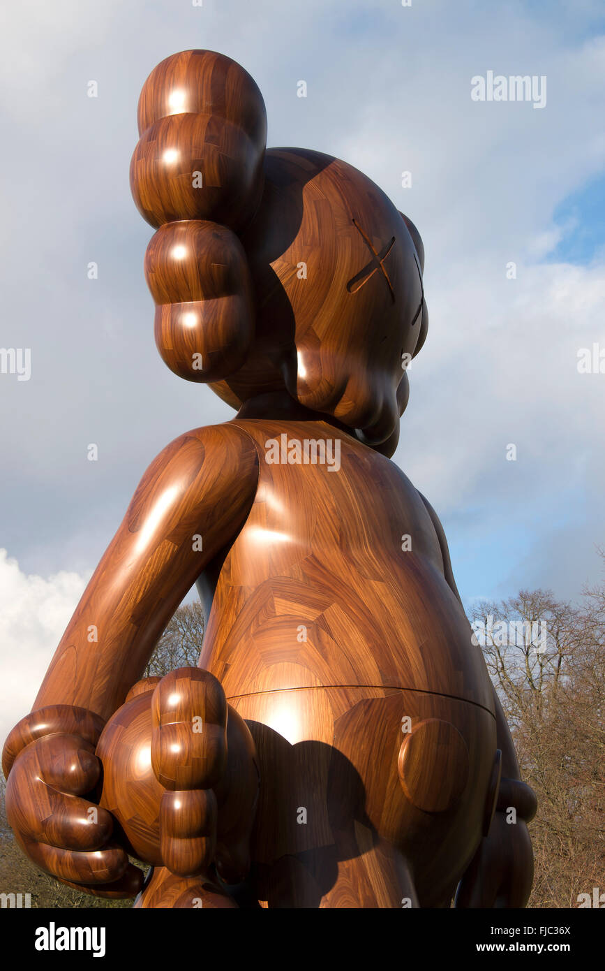 The Large Wooden Cartoon Sculpture Good Intentions by Kaws at Yorkshire  Sculpture Park West Bretton Wakefield Yorkshire England Stock Photo - Alamy