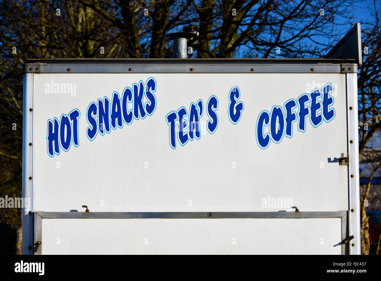 Snack Wagon sign. 'HOT SNACKS TEA'S & COFFEE'. Stock Photo
