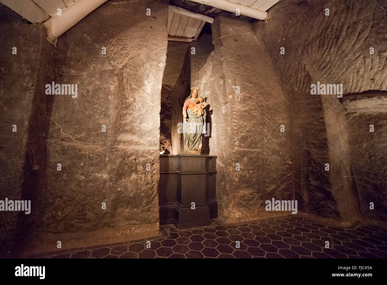 Europe, Poland, Wieliczka Salt Mine, Holy Cross Chapel, Saint Mary with Child statue, UNESCO World Heritage site Stock Photo