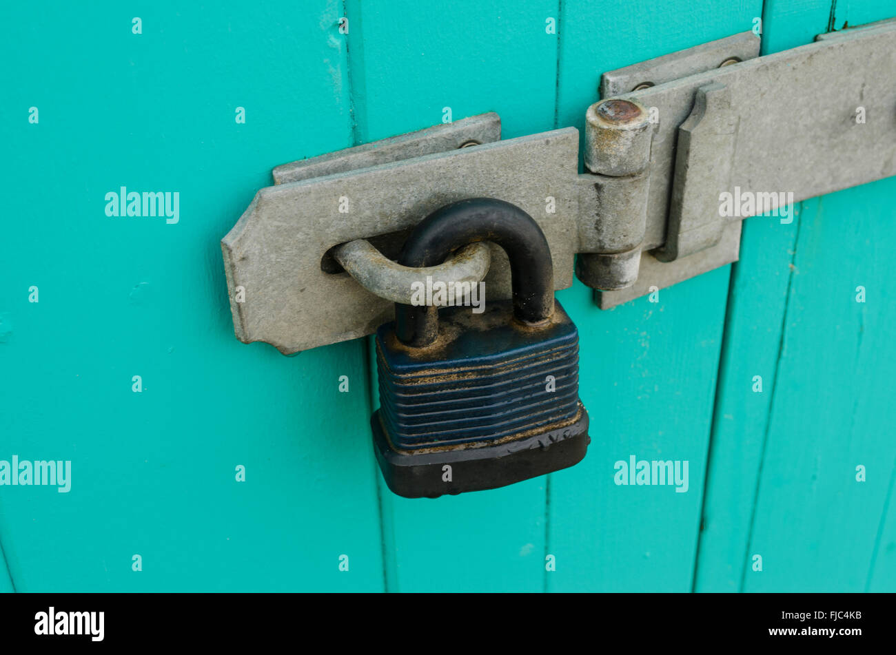 Closeup detail of padlock and hasp Stock Photo