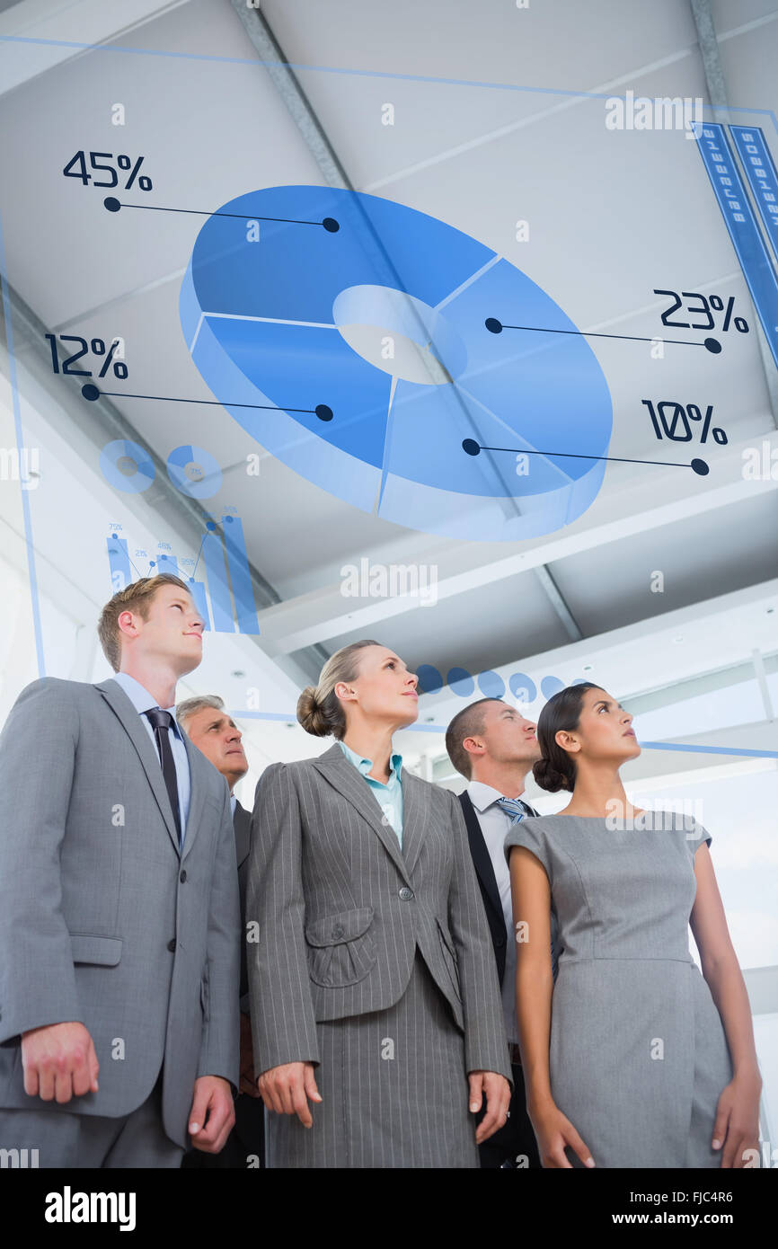 Composite image of business team looking up Stock Photo - Alamy