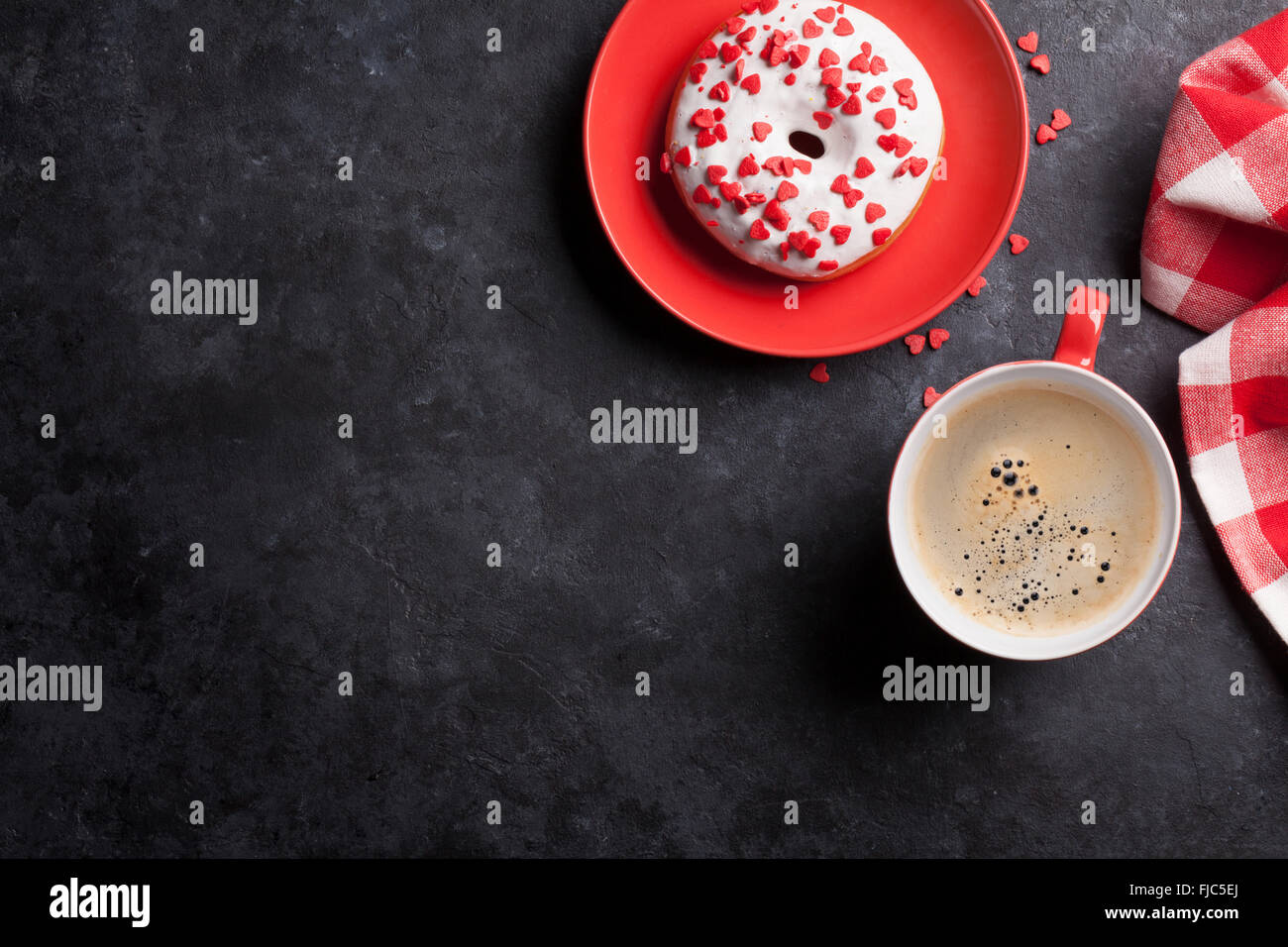 Donut and coffee on stone table. Top view with copy space Stock Photo ...