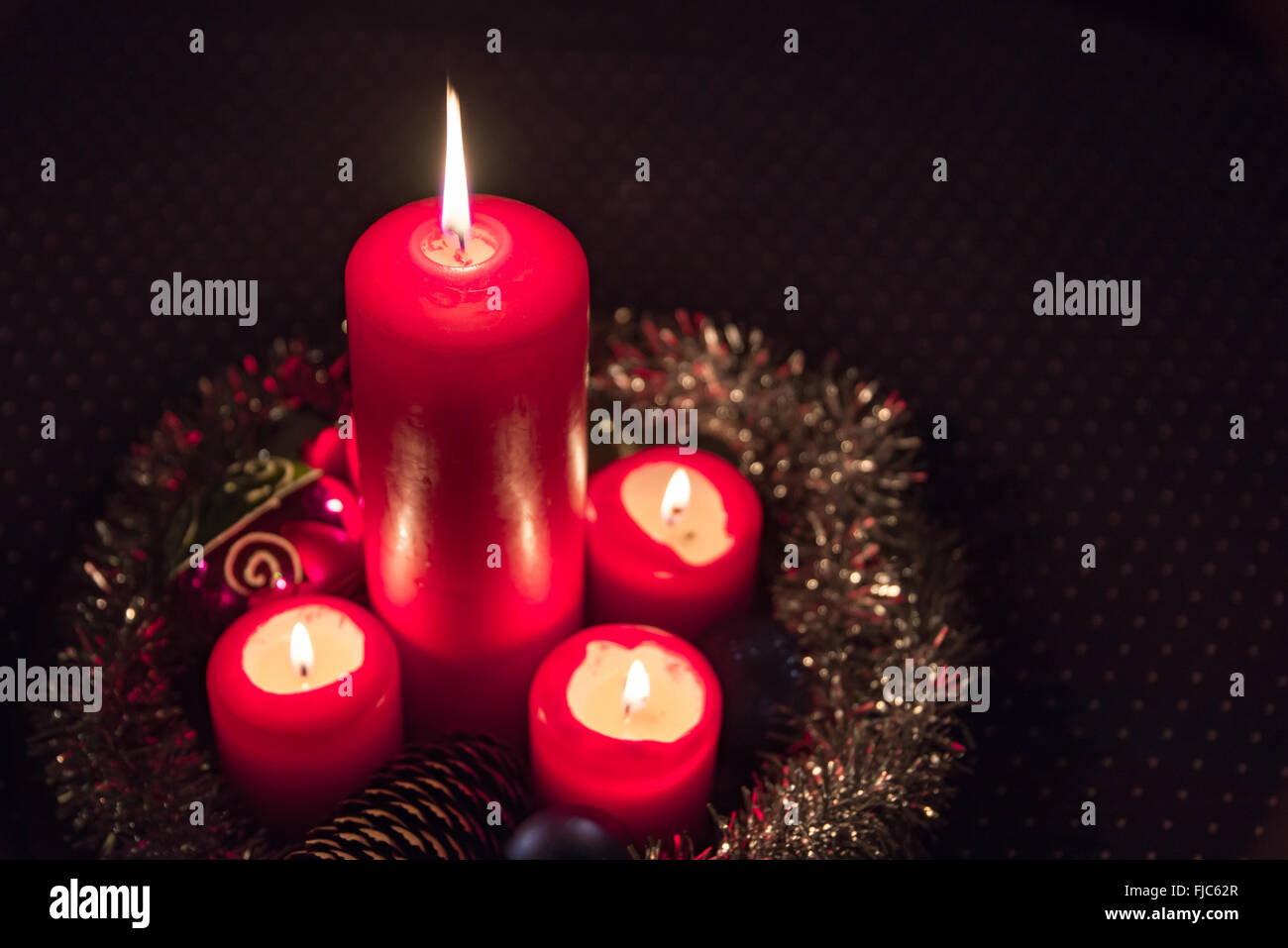Candlelight on the Advent wreath Stock Photo