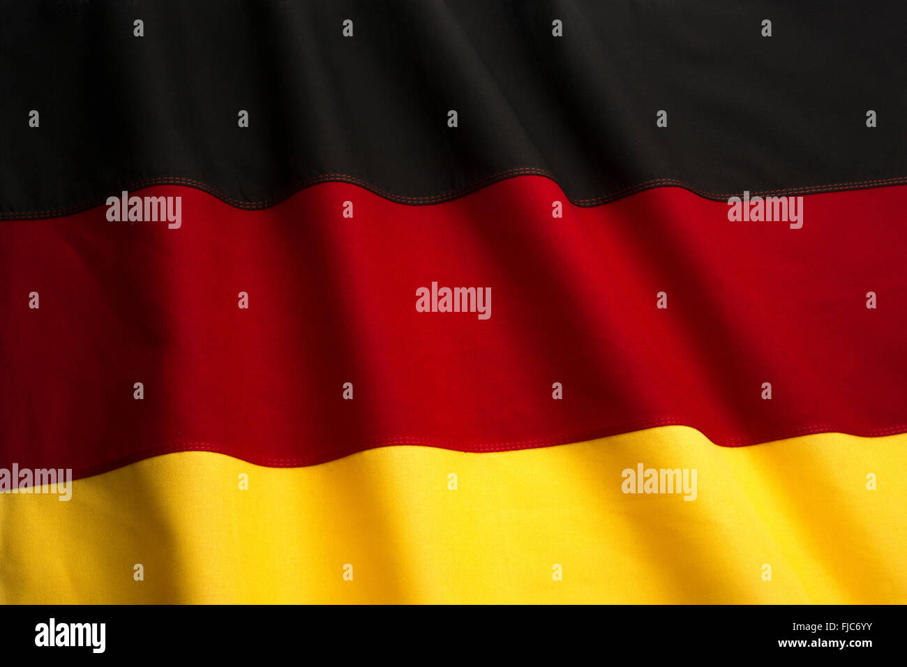 GERMAN FLAG MADE OF STITCHED COTTON BUNTING Stock Photo