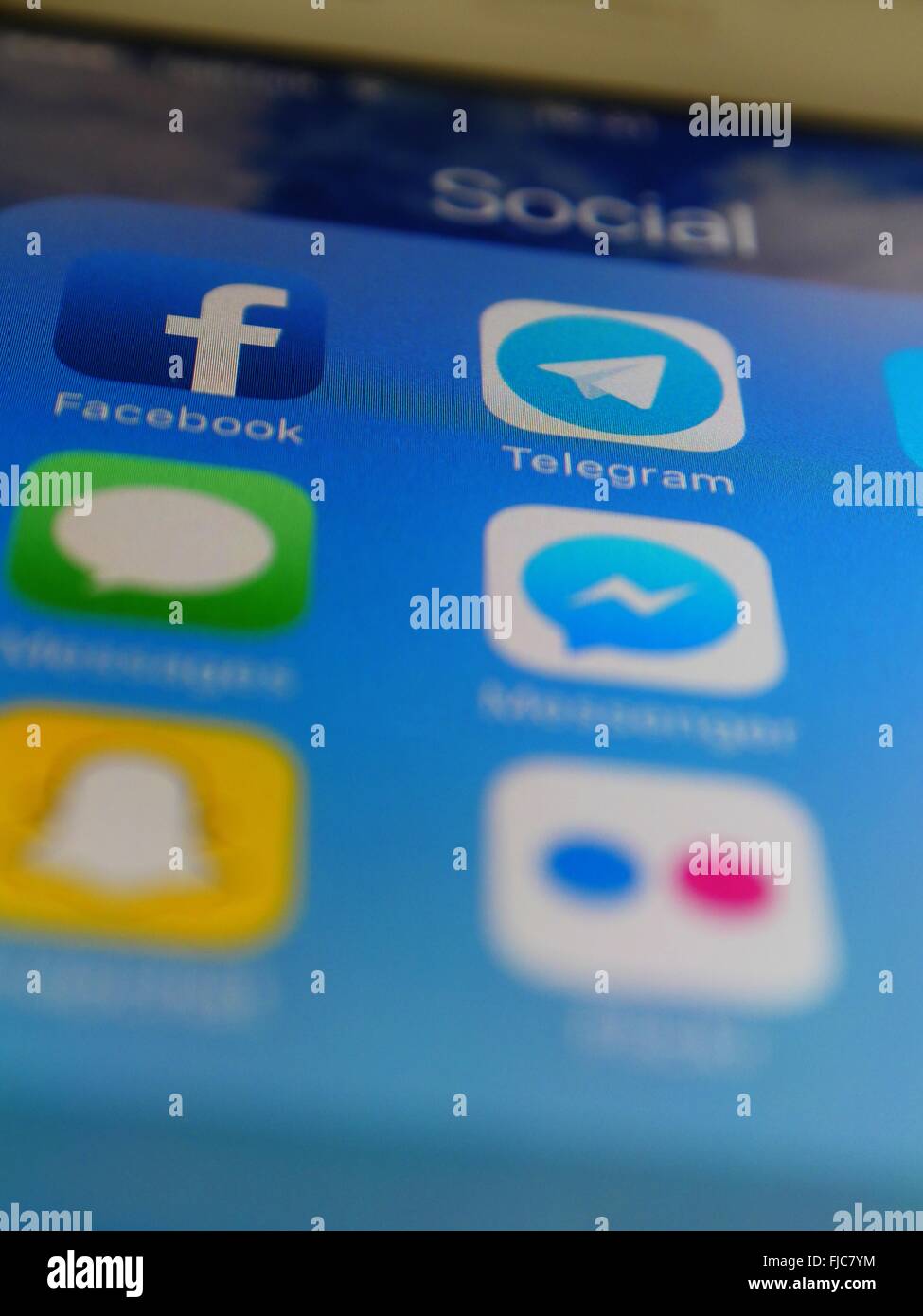Apple Iphone screen showing apps including facebook and telegram Stock Photo