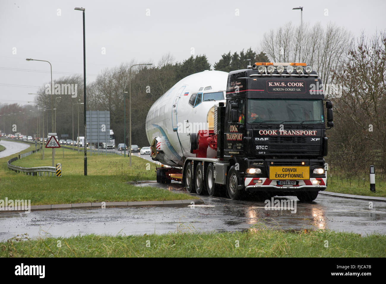An abnormal load consisting of a Boeing 737 airliner fuselage travels along the A419 at Cirencester causing a traffic jam Stock Photo