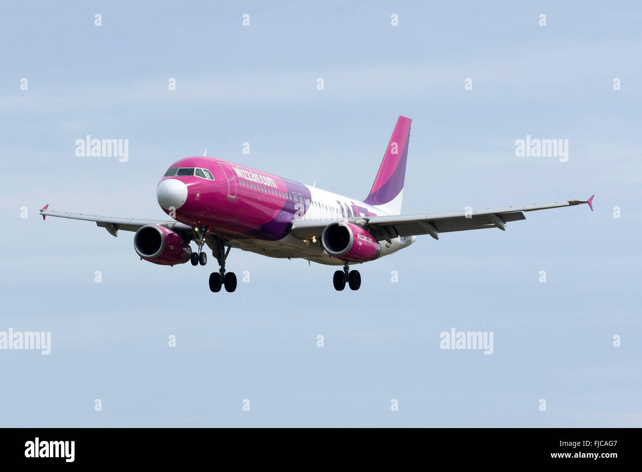 Wizz Air Airbus A320-232 [HA-LWI] on finals for runway 31, with a replaced white nose cone. Stock Photo