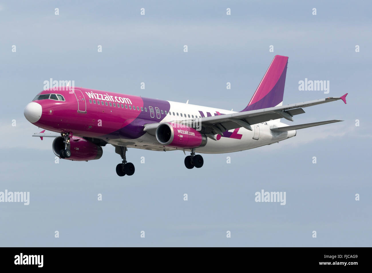 Wizz Air Airbus A320-232 [HA-LWI] on finals for runway 31, with a replaced white nose cone. Stock Photo