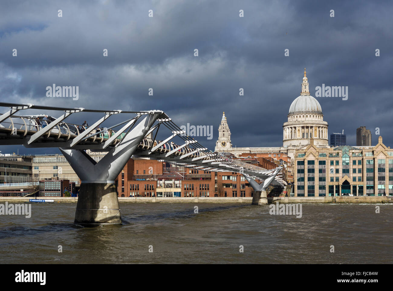 View of Millennium Bridge and River Thames looking towards St Paul's Cathedral, London, England, UK Stock Photo
