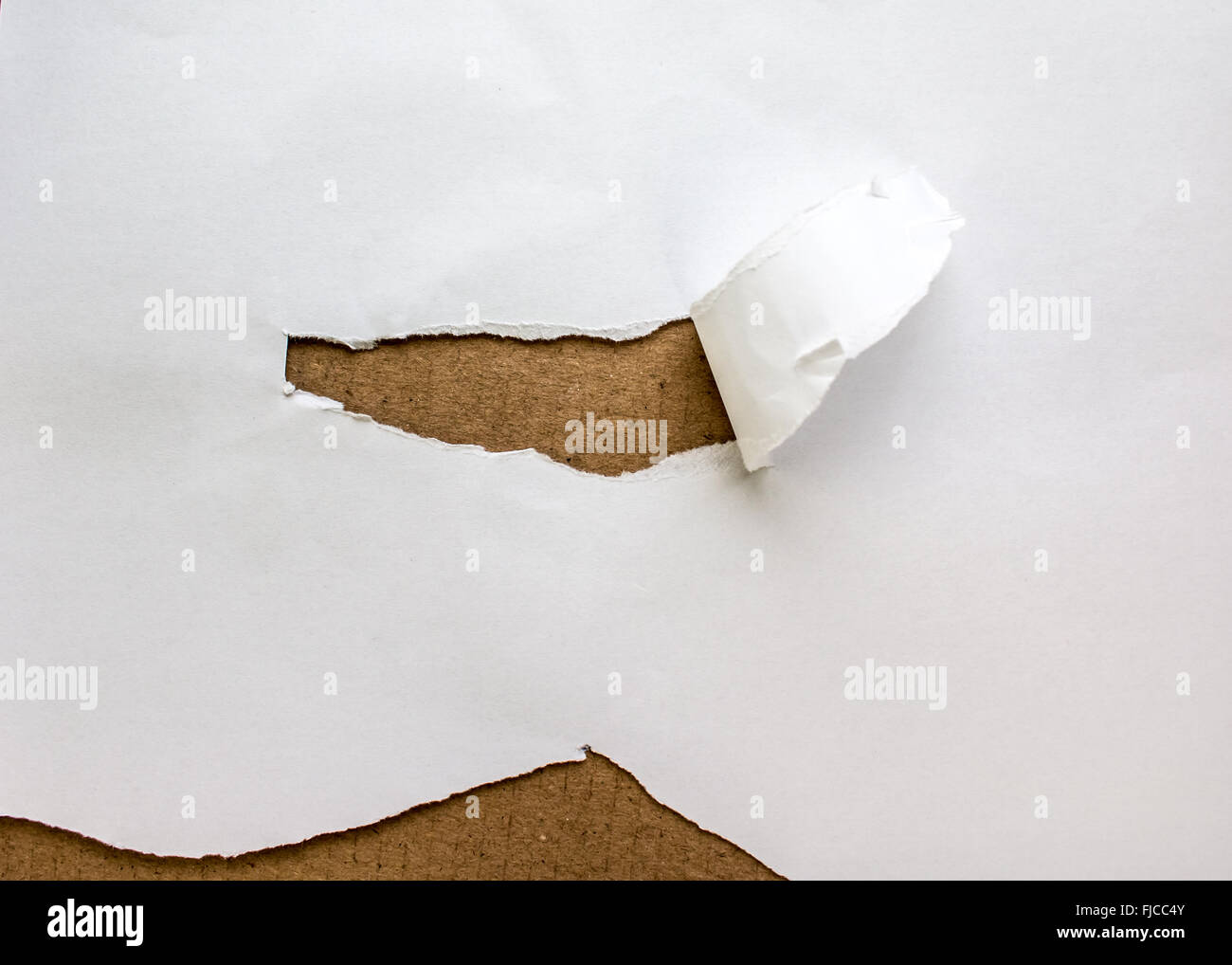 Beige circle shape breakthrough paper hole with white background Stock ...