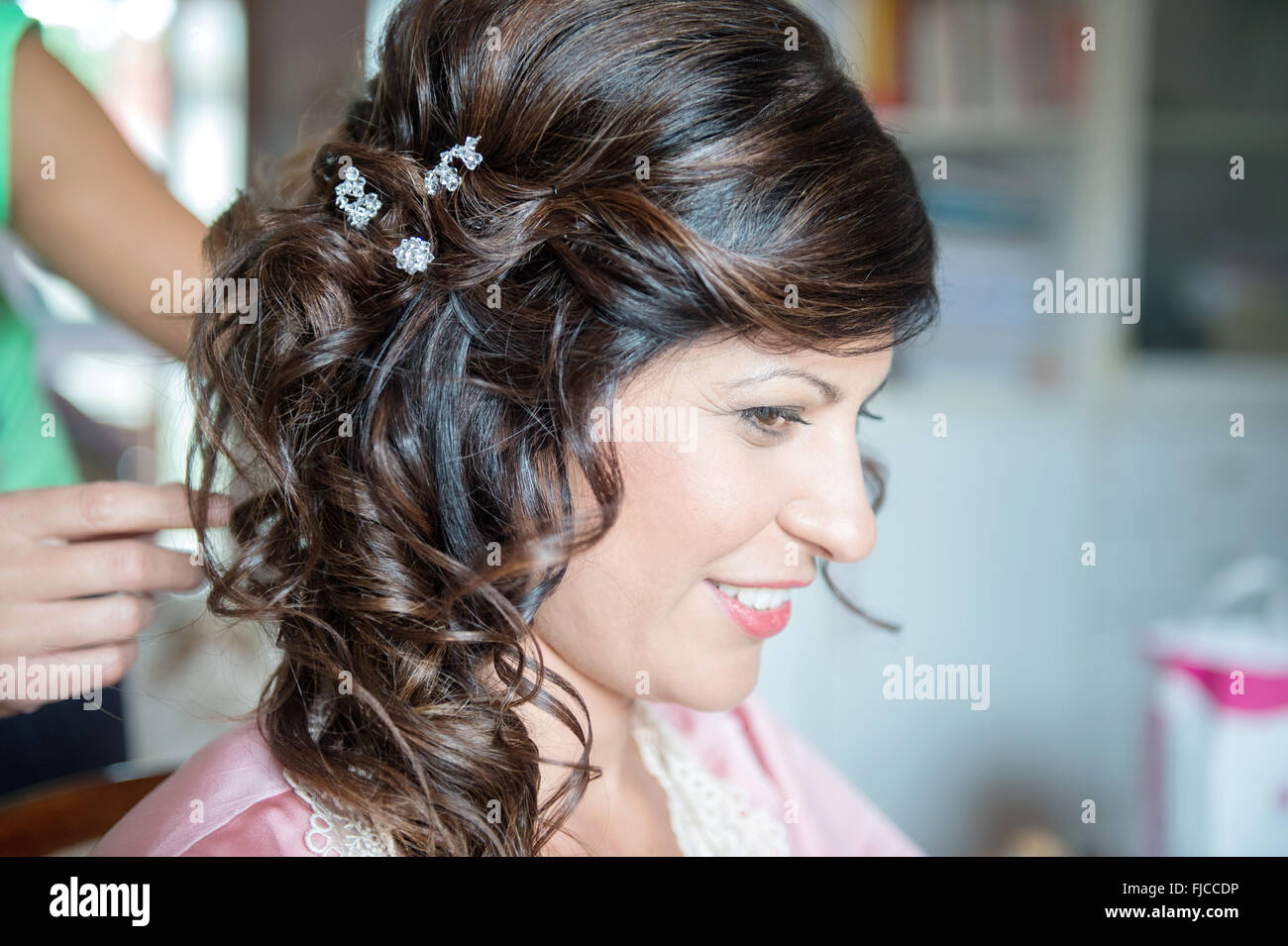 hairstyle of girl with hair clips Stock Photo