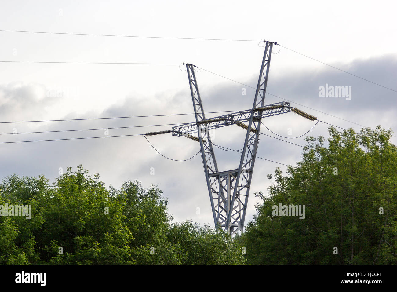 tower of high voltage power line over the forest Stock Photo - Alamy