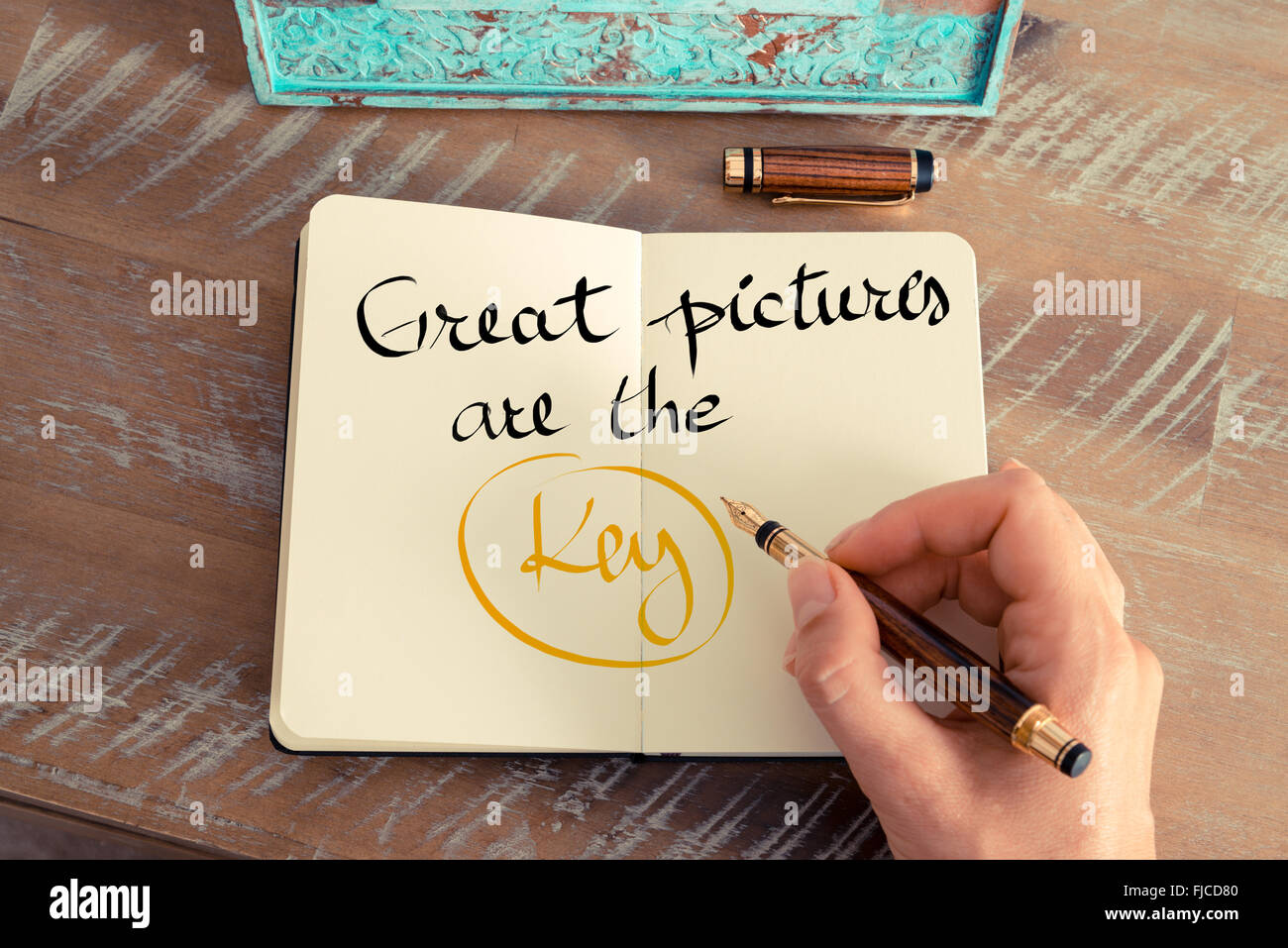Handwritten text Great Pictures Are The Key as business concept image Stock Photo