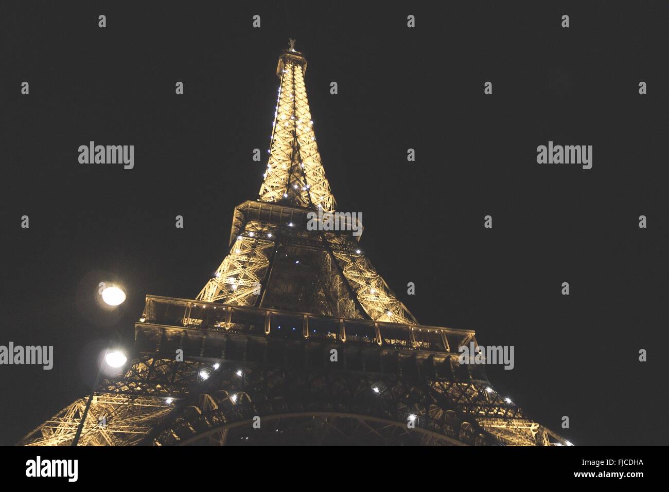 Paris, France - circa September 2012: A night photograph of the Tour Eiffel taking underneath the structure looking up, photos h Stock Photo