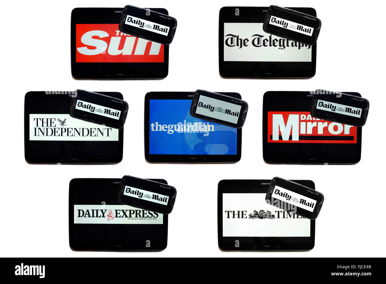 The Daily Mail newspaper logo on smartphone screens surrounded by tablets displaying the logos of rival newspapers. Stock Photo