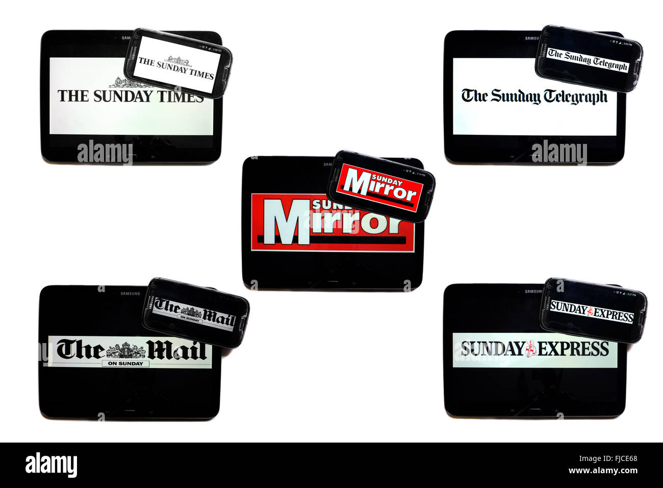 Sunday newspaper logos displayed on tablet and smartphone screens against a white background. Stock Photo