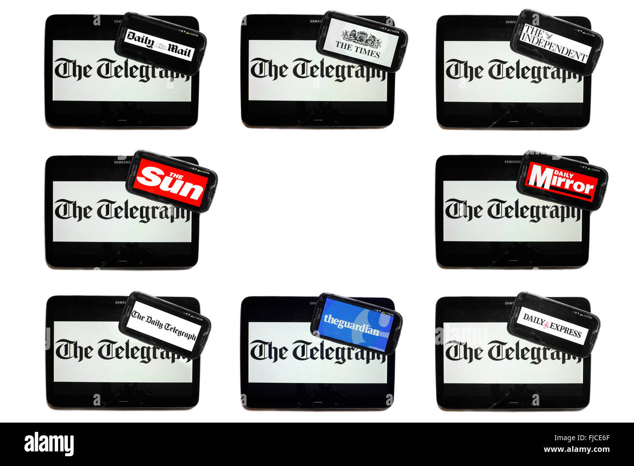 The Telegraph newspaper logo on tablet screens surrounded by smartphones displaying the logos of rival newspapers. Stock Photo