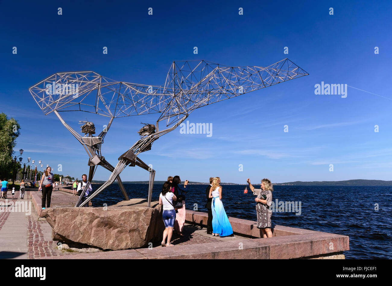 Sculpture “Fishers Casting a Net” in Petrozavodsk (Karelia, Russia) Stock Photo