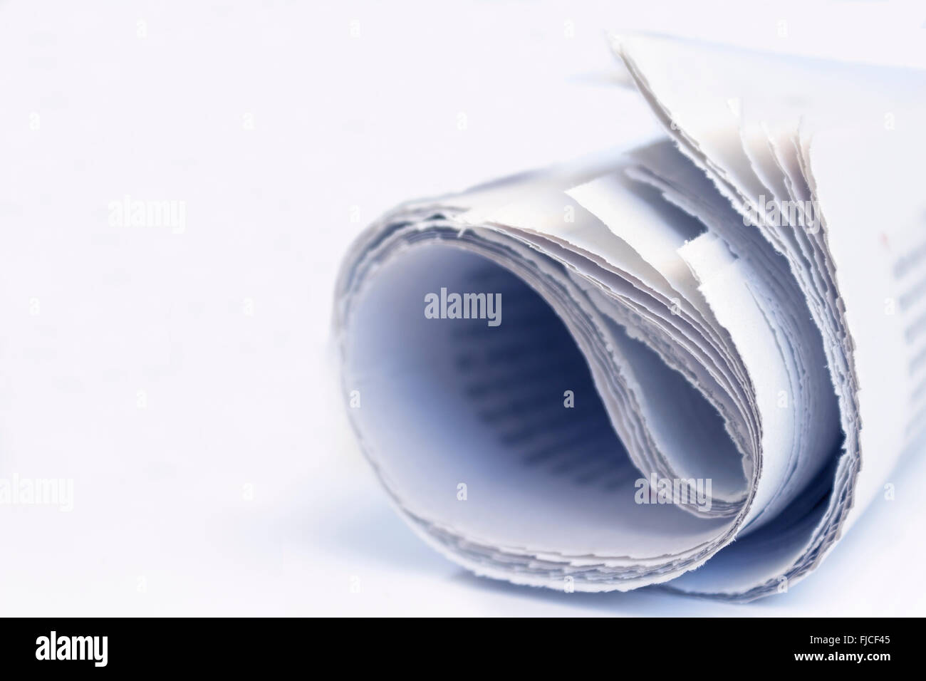 Roll of newspaper Stock Photo