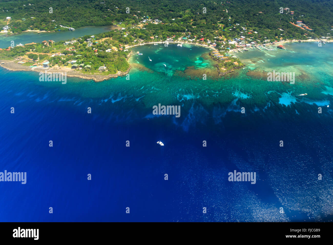Aerial view of West End Roatan island and tropical coral reef Stock Aerial view of West End Roatan island and tropical coral reef Stock