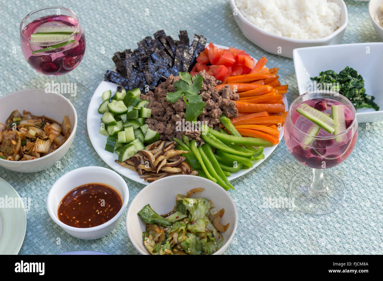 Korean bibimbap dinner with many classic sides Stock Photo