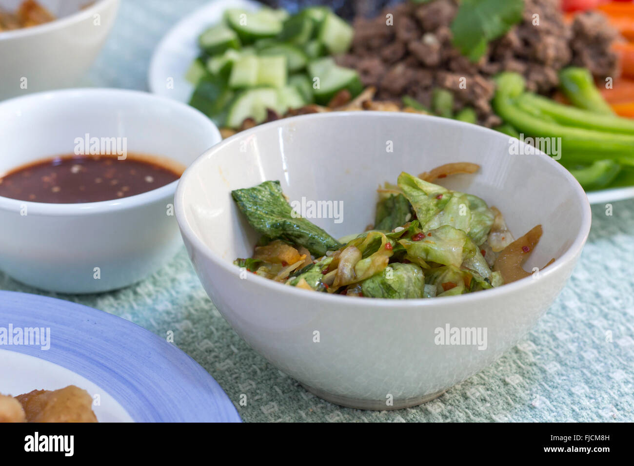 Korean bibimbap with lettuce salad sangchu-geotjeori side dish Stock Photo