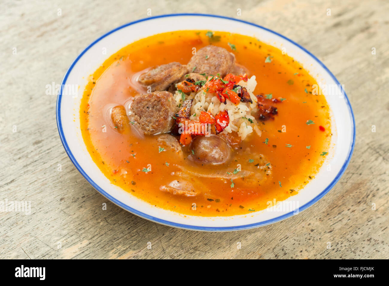 Sausage and rice tomato soup cajun gumbo Stock Photo Alamy