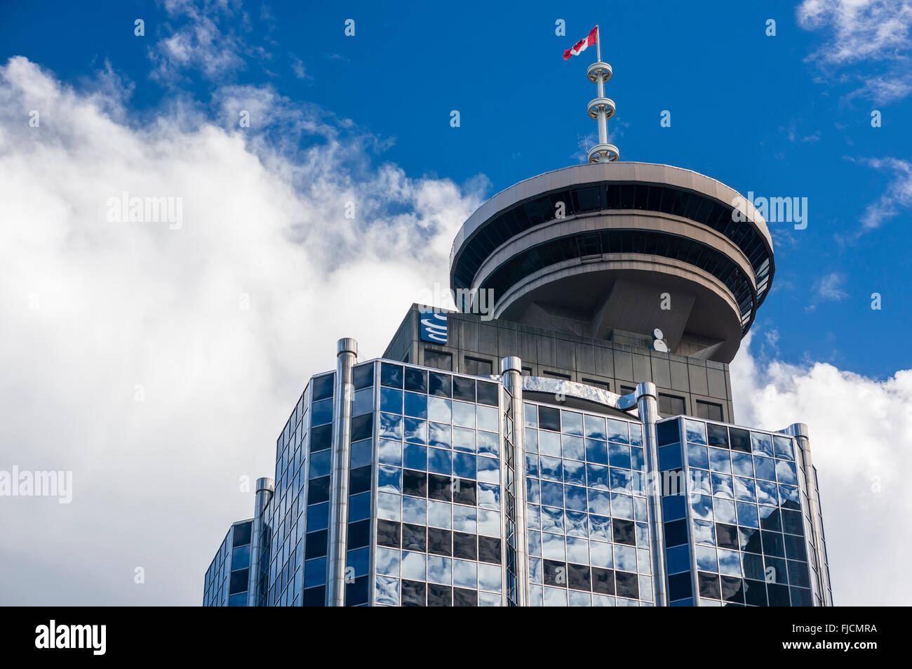 Harbour Centre with Canadian flag in Vancouver BC, Canada Stock Photo