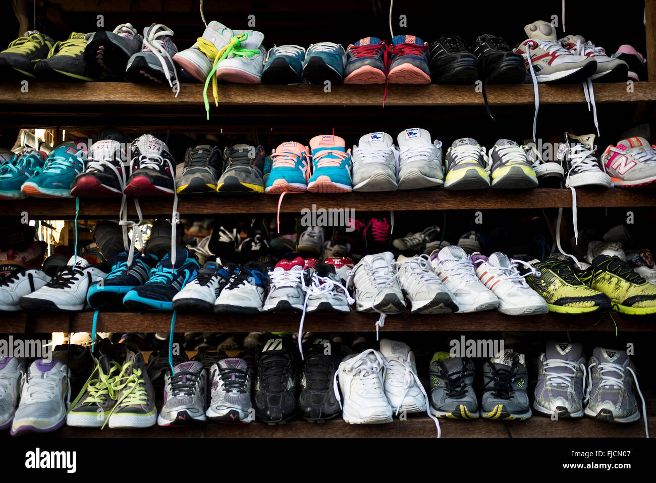 Kalibo, Philippines - February 13, 2016. Second hand shoes on the shelf of  a store Stock Photo - Alamy