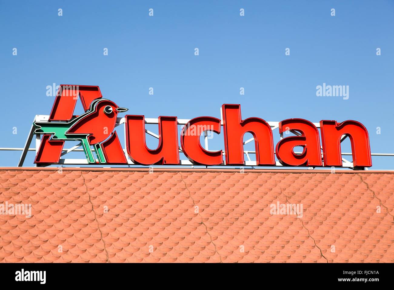 Auchan sign on a roof Stock Photo
