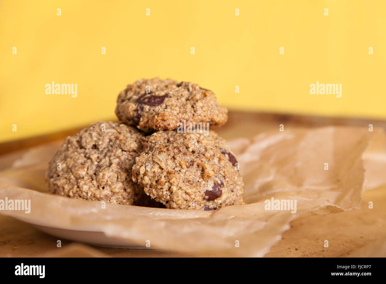 Oatmeal Cookies with a colorful yellow backdrop Stock Photo