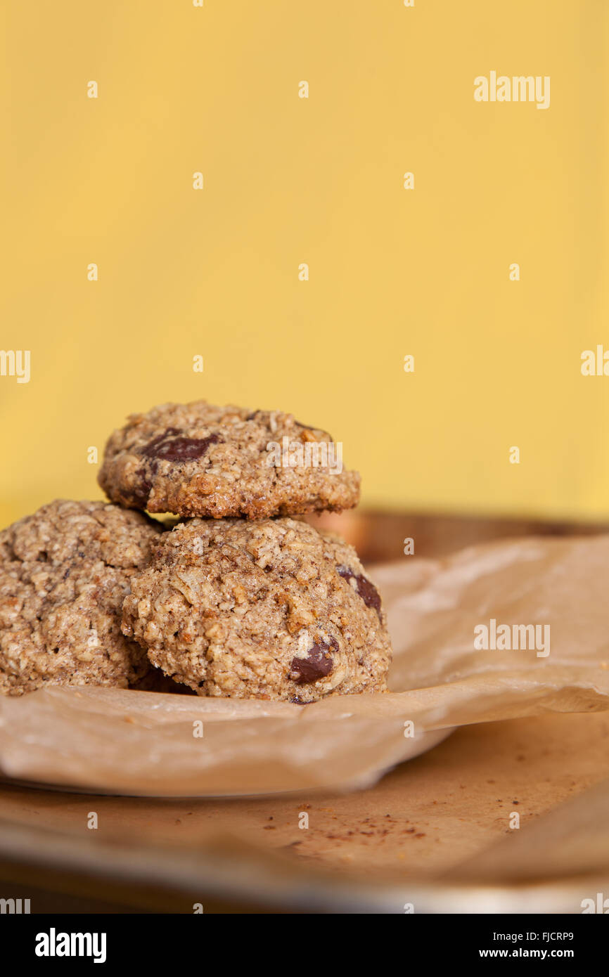 Oatmeal Cookies with a colorful yellow backdrop Stock Photo
